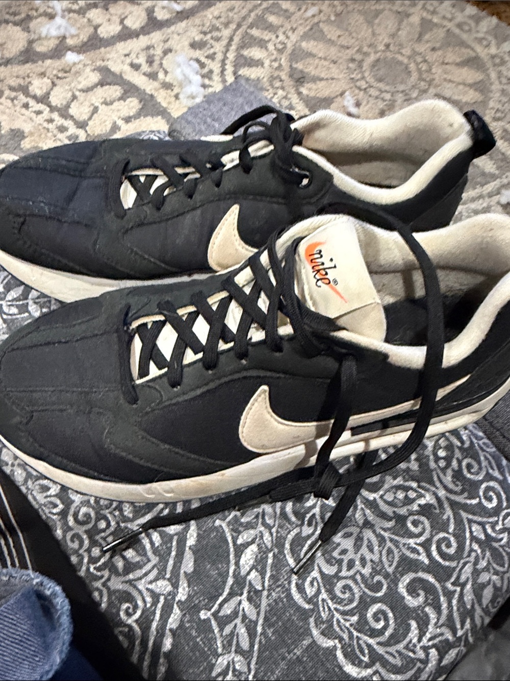 Nike Black Sneakers with Cream Swoosh
